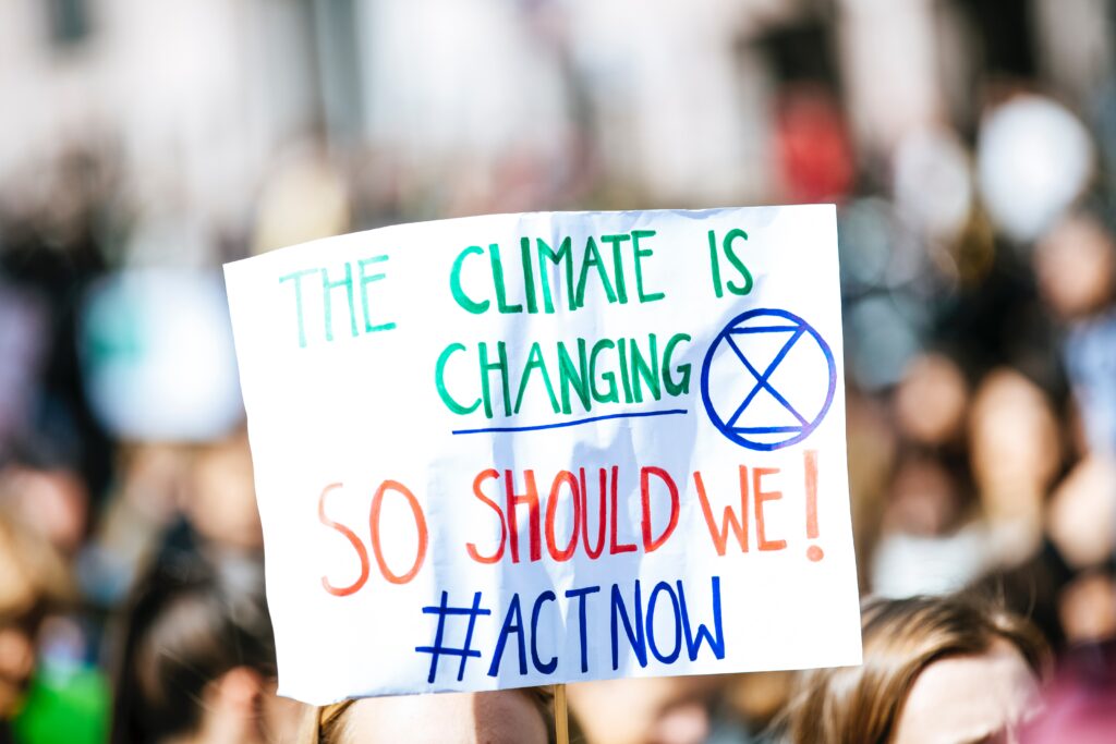 climate change sign at protest