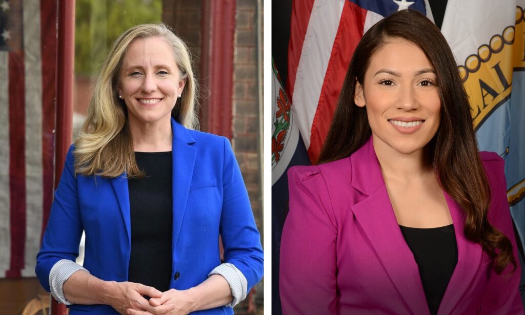 Abigail Spanberger, a blonde woman wearing blue, and Yesli Vega, a brunette wearing pink