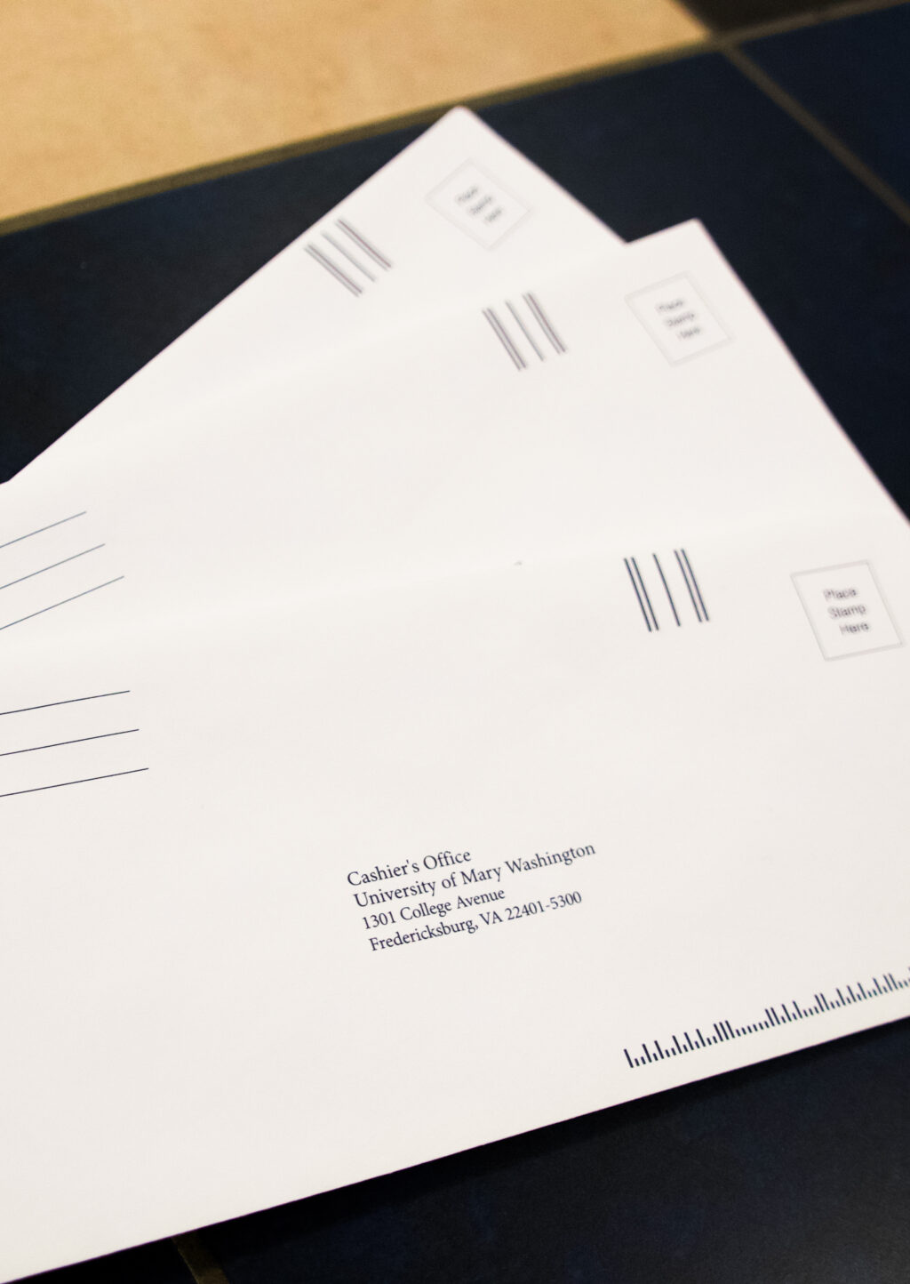Three envelopes that have the Cashier Office location