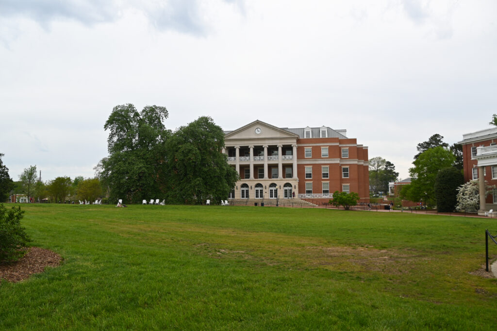 An overview of a field of grass facing the Cedrick Rucker University Center.